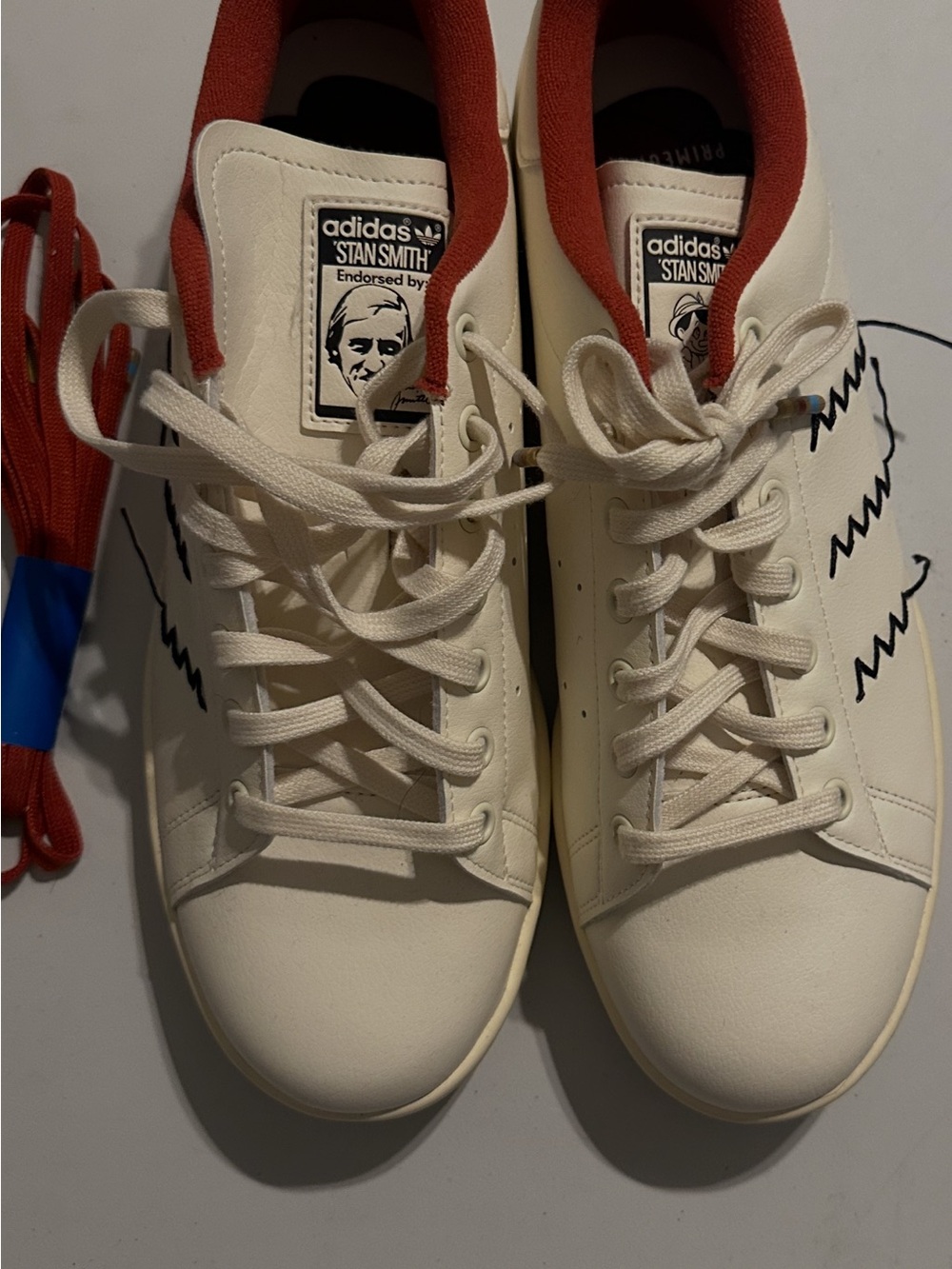 Adidas Stan Smith Pinocchio Edition White with Red Trim Athletic Sneakers
